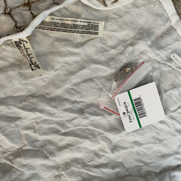 Bling Bling Cha Ching Bodysuit white
Free People - Picture 10 of 10